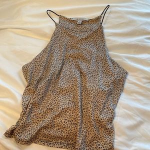 This is a size xs, gaze, cheeta print  tank top